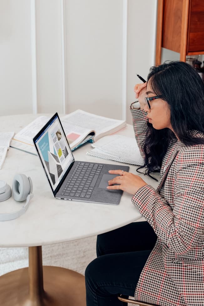 Professional working on a laptop at home